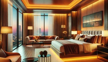 DALL·E 2024-11-26 03.00.31 - A luxurious hotel room with vibrant lighting in shades of brown and beige, featuring a king-sized bed with plush bedding, a modern headboard, and eleg